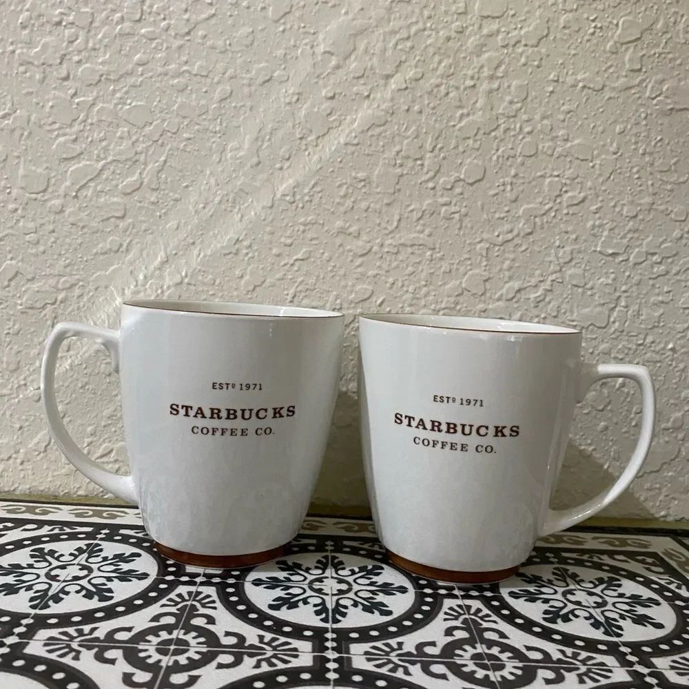 STARBUCKS 2008 Abbey set of 2 white brown print coffee mugs EST 1971 18 oz